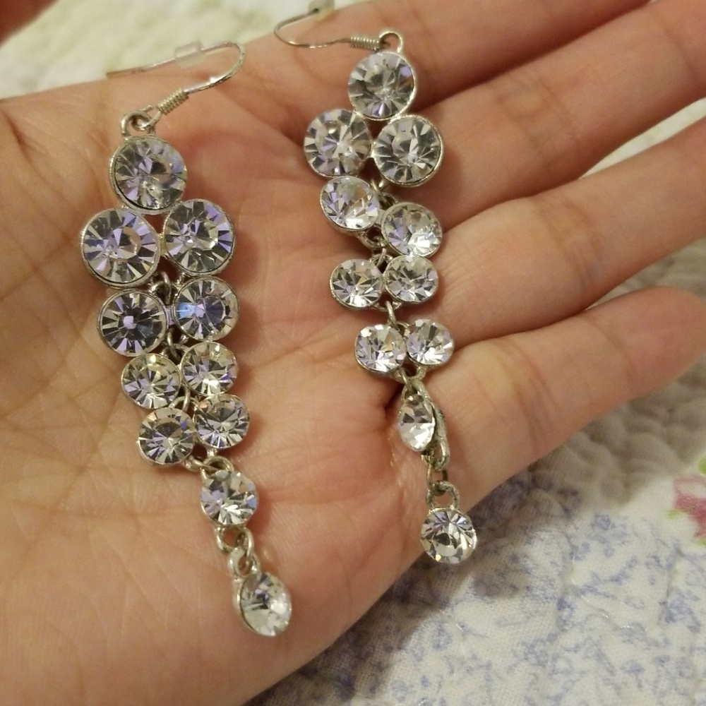 [Claire's] dangling earrings